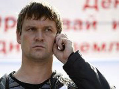 Opposition activist claims torture, police say he turned himself in