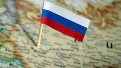 Only by playing an active role in developing the principles of a new world order will Russia secure a decent place in the world , Russian political scientist Igor Panarin believes