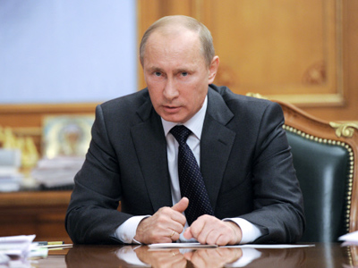 Putin slams 'disgusting' Gaddafi death coverage