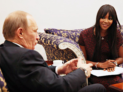 Putin talks tigers with Naomi Campbell