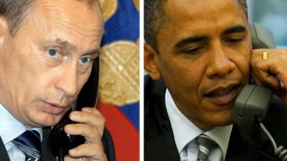 Vladimir Putin and Barack Obama discussed the Syrian crisis on Wednesday via telephone (AFP Photo/Itar-Tass/Jim Watson)