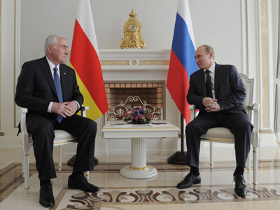 Putin pledges constant help to South Ossetia president