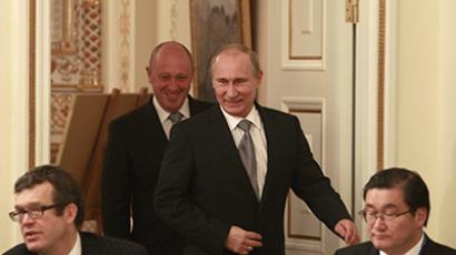 Russia's President Vladimir Putin enters a hall to take part in a meeting of the Valdai international discussion group of experts at the Novo-Ogaryovo residence outside Moscow on October 25, 2012. (AFP Photo / Sergei Karpukhin)