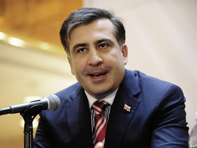 Saakashvili talks tough as Georgian opposition promises change