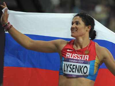 Lysenko wins hammer throw with Olympic record