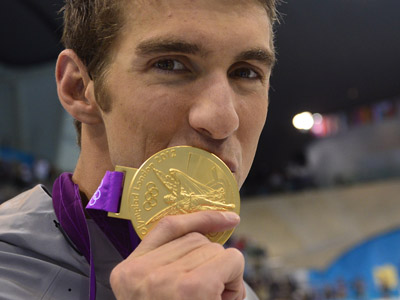 Phelps accused of violating Olympic rules, swimmer’s agent denies