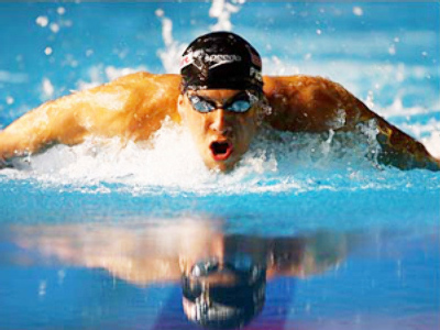 Phelps returns to swimming pool after Beijing triumph