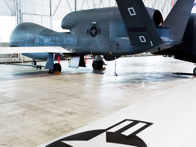 One of several the US Navy's Northrop Grumman MQ04C Broad Area Maritime Surveillance(BAMS) Unmanned Aircraft Systems(UAS) is seen in a hangar July 31, 2012 at Naval Air Station Patuxent River, Maryland.(AFP Photo / Paul J. Richards)