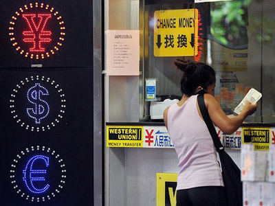 China threatens US with trade war over currency bill