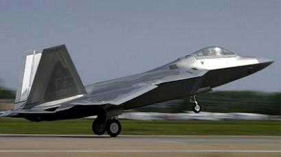 The first F/A-22 Raptor destined for the First Fighter Wing performs a fly-by shortly before being delivered 12 May 2005 at Langley Air Force Base, Viginia. (Win McNamee/Getty Images/AFP)