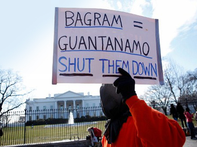 Gitmo tribunal goes on despite Obama's vow