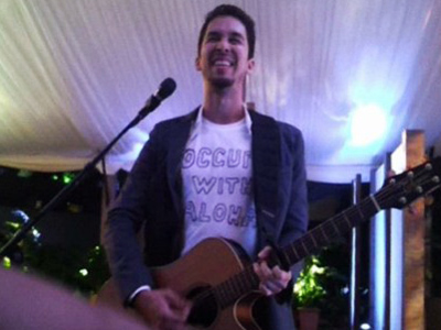 Musician shocks Obama’s party with Occupy song
