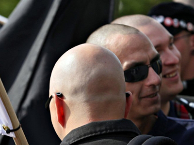 Germany, Berlin : Neo-Nazi skinheads take part in a right-wing rally in Berlin on May 1, 2010. (AFP Photo / David Gannon)