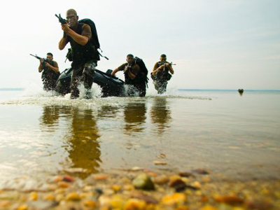 Marines land at nudist beach