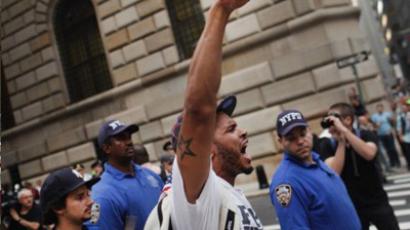 New York: Demonstrators opposed to corporate profits on Wall Street march in the Financial District on September 26, 2011 New York City. Hundreds of activists affiliated with the "Occupy Wall Street" demonstrations have begun living in a park in the Financial District near Wall Street. (Spencer Platt/Getty Images/AFP )