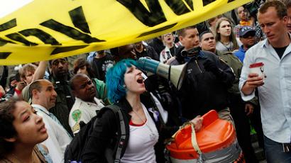Occupy Wall Street protestors react as they are told to remove banners and signs from an area of Union Square Park in New York City by police March 21, 2012 (Reuters / Mike Segar)