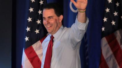 Koch brothers threaten to fire employees if Obama wins