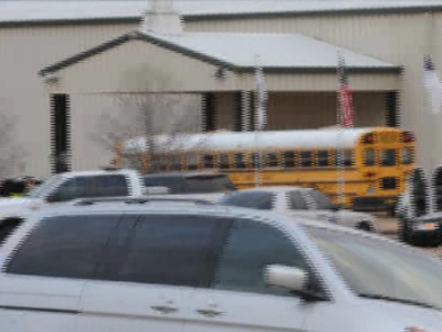 Alabama gunman shoots school bus driver, takes child hostage