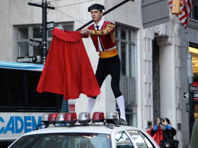 Clowns and matador fight Wall Street bull (VIDEO)