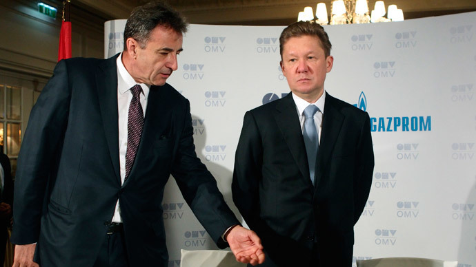 OMV CEO Gerhard Roiss (L) and Gazprom CEO Alexei Miller prepare for a news conference after signing the final deal to build a branch of the South Stream gas pipeline ending in Austria, in Vienna June 24, 2014. (Reuters / Heinz-Peter Bader)