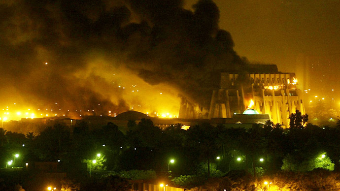 An explosion rocks Baghdad during air strikes March 21, 2003. (Reuters)