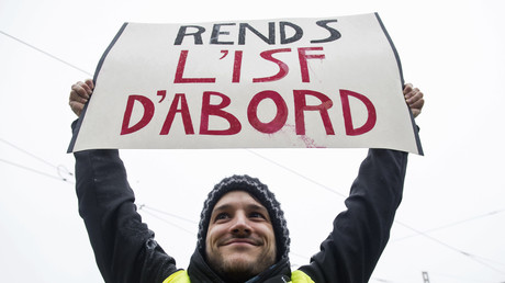 Un manifestant Gilet jaune à Nantes le 15 décembre 2018, réclamant le retour de l'ISF. 
